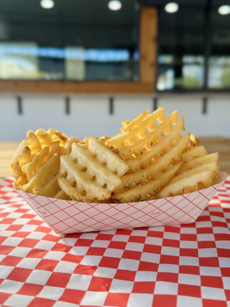 Crispy waffle fries with house seasoning blend