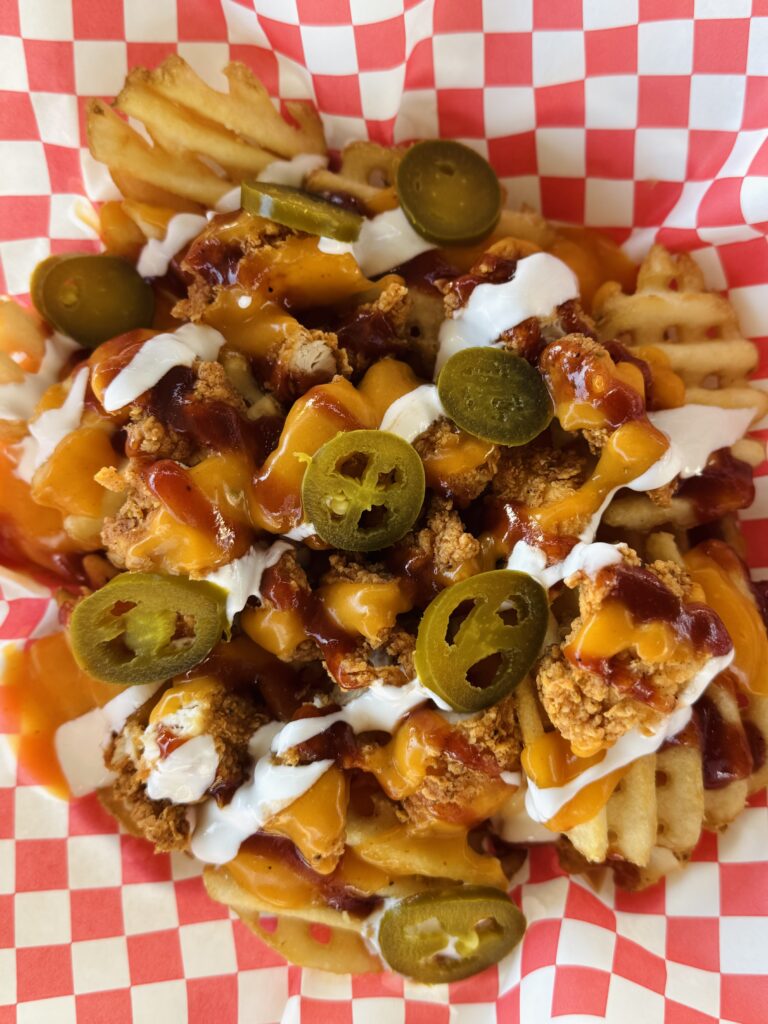 Yardbird loaded waffle fries at Island Chick-N-Shack